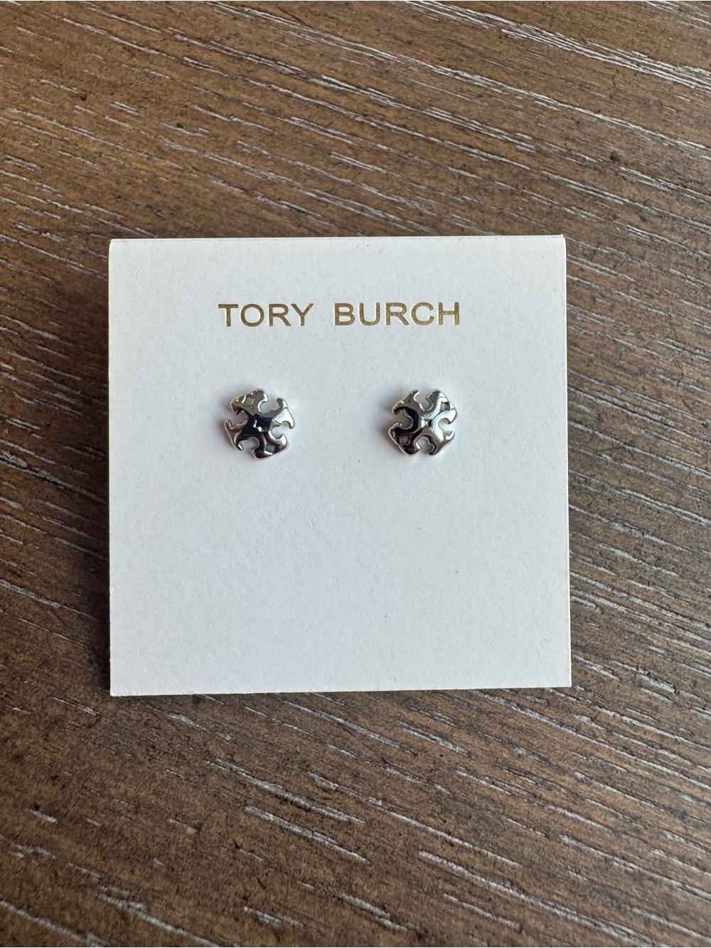Tory Burch Silver Logo Stud Earrings on Card